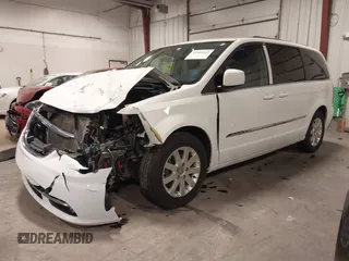 2016 Chrysler Town & Country Touring with VIN 2C4RC1BG1GR185657, listed as a IAAI auction lot 41905462 with 167,142 mi miles and . Bid and sale history available at DreamBid. Image 2.