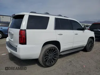 2018 Chevrolet Tahoe Premier with VIN 1GNSKCKC6JR195246, listed as a Copart auction lot 54887165 with 135,973 mi miles and Salvage title. Bid and sale history available at DreamBid. Image 3.