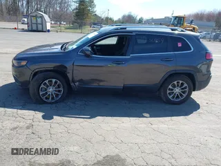 2019 Jeep Cherokee Altitude z VIN 1C4PJMLX5KD456471, wystawiony jako IAAI lot #41930854 z przebiegiem 58 083 mil mil oraz . Historia ofert i sprzedaży dostępna na DreamBid. Obrazek 14.