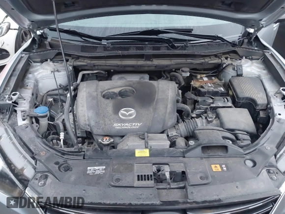 2016 Mazda CX-5 Sport with VIN JM3KE2BY5G0647715, listed as a IAAI auction lot 41831228 with 89,689 mi miles and . Bid and sale history available at DreamBid. Image 10.