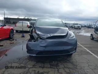 2022 Tesla Model Y Long Range with VIN 7SAYGDEE8NF317482, listed as a IAAI auction lot 41806043 with 32,108 mi miles and . Bid and sale history available at carsss.com. Image 13.