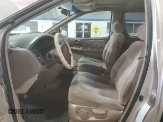 2000 Toyota Sienna LE z VIN 4T3ZF13C6YU210501, wystawiony jako Copart lot #56510955 z przebiegiem 253 950 mil mil oraz Szkody całkowita. Historia ofert i sprzedaży dostępna na DreamBid. Obrazek 7.