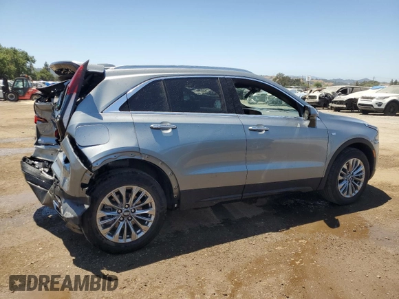 2024 Cadillac XT4 AWD Premium Luxury with VIN 1GYFZDR48RF153128, listed as a Copart auction lot 60712485 with 14,765 mi miles and Salvage title. Bid and sale history available at DreamBid. Image 3.