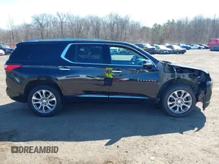 2018 Chevrolet Traverse Premier with VIN 1GNEVJKW8JJ159561, listed as a IAAI auction lot 41774914 with 132,598 mi miles and . Bid and sale history available at DreamBid. Image 13.