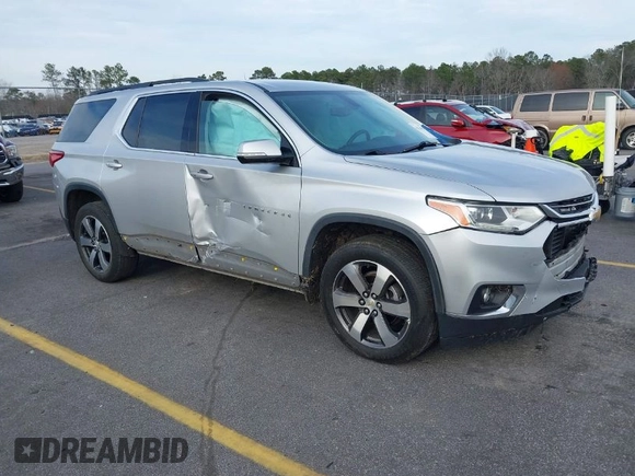 2019 Chevrolet Traverse LT with VIN 1GNERHKW6KJ140036, listed as a IAAI auction lot 41610615 with 98,685 mi miles and . Bid and sale history available at DreamBid. Image 1.