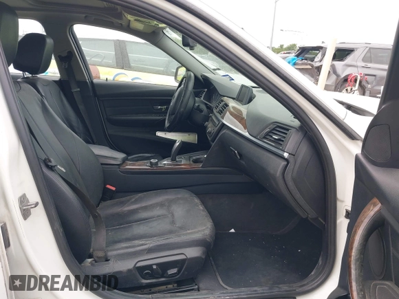 2014 BMW 3 Series 320i xDrive with VIN WBA3C3C52EP661389, listed as a IAAI auction lot 42160042 with 131,997 mi miles and . Bid and sale history available at DreamBid. Image 5.