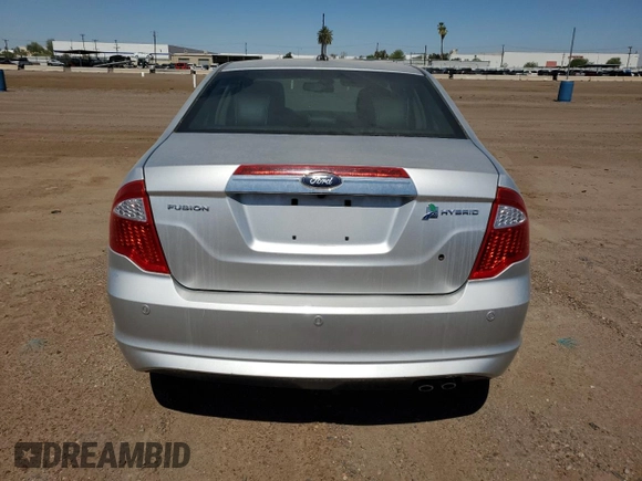 2011 Ford Fusion Hybrid с VIN 3FADP0L36BR251407, выставлен на аукционе Copart как лот 57838085 с пробегом 129 972 миль миль и Чистый • Clean title. История ставок и продаж доступна на DreamBid. Изображение 6.