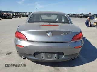 2011 BMW Z4 sDrive35i with VIN WBALM7C59BE384283, listed as a Copart auction lot 77204914 with 87,016 mi miles and Salvage Title. Bid and sale history available at carsss.com. Image 6.