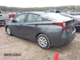 2021 Toyota Prius L Eco with VIN JTDKAMFU6M3140081, listed as a IAAI auction lot 42131187 with 103,973 mi miles and . Bid and sale history available at DreamBid. Image 3.