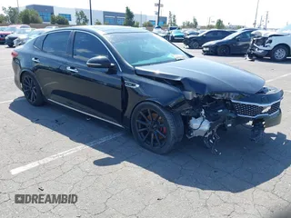 2016 Kia Optima SXL Turbo with VIN 5XXGV4L20GG042682, listed as a IAAI auction lot 41456456 with 117,542 mi miles. Bid and sale history available at carsss.com. Image 1.