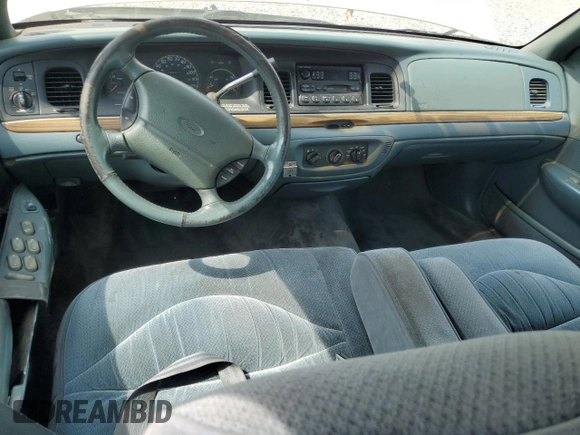 1996 Ford Crown Victoria LX с VIN 2FALP74W1TX192976, выставлен на аукционе Copart как лот 56104895 с пробегом 144 011 миль миль и Списание • Salvage title. История ставок и продаж доступна на DreamBid. Изображение 8.