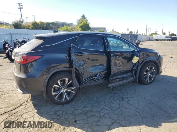 2019 Lexus RX 450h with VIN 2T2BGMCA4KC036097, listed as a Copart auction lot 61475175 with 63,811 mi miles and Salvage title. Bid and sale history available at DreamBid. Image 3.