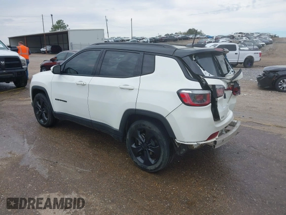 2020 Jeep Compass Latitude with VIN 3C4NJCBB9LT118042, listed as a IAAI auction lot 41811634 with 62,717 mi miles and . Bid and sale history available at carsss.com. Image 3.