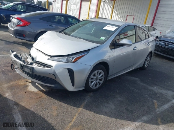 2021 Toyota Prius L Eco with VIN JTDKAMFU8M3135514, listed as a IAAI auction lot 40977114 with 70,451 mi miles. Bid and sale history available at carsss.com. Image 18.