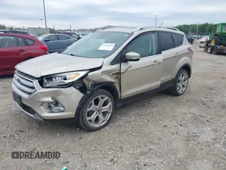 2018 Ford Escape Titanium with VIN 1FMCU9J94JUA44964, listed as a IAAI auction lot 42494471 with 100,955 mi miles and . Bid and sale history available at DreamBid. Image 2.