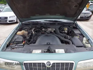 1997 Mercury Grand Marquis GS z VIN 2MELM74W8VX735986, wystawiony jako IAAI lot #42127919 z przebiegiem 135 895 mil mil oraz . Historia ofert i sprzedaży dostępna na DreamBid. Obrazek 10.
