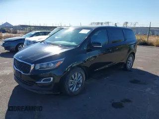 2020 Kia Sedona EX with VIN KNDMB5C11L6594029, listed as a IAAI auction lot 40951800 with 164,989 mi miles. Bid and sale history available at carsss.com. Image 2.