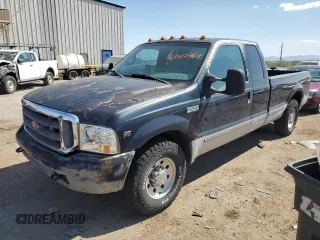 1999 Ford F-250 XL with VIN 1FTNX20S9XED77115, listed as a Copart auction lot 76047764 with 390,275 mi miles and Salvage title. Bid and sale history available at DreamBid. Image 1.