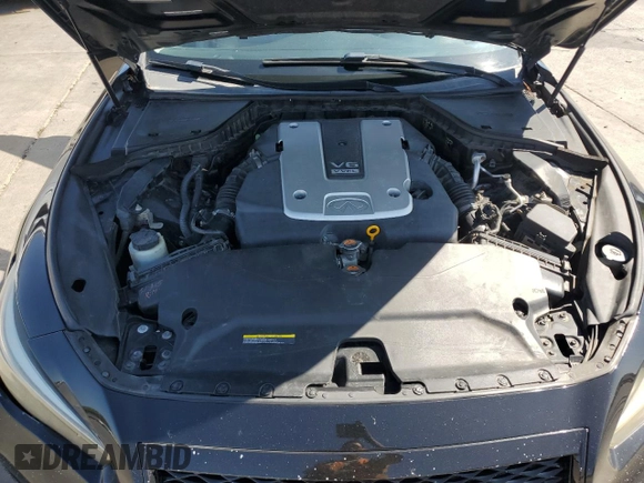 2014 Infiniti Q50 Premium with VIN JN1BV7ARXEM687605, listed as a Copart auction lot 61275535 with 104,337 mi miles and Salvage title. Bid and sale history available at DreamBid. Image 11.