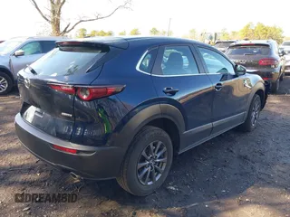 2024 Mazda CX-30 S z VIN 3MVDMBAM8RM634233, wystawiony jako IAAI lot #41820443 z przebiegiem 8 540 mil mil oraz . Historia ofert i sprzedaży dostępna na DreamBid. Obrazek 4.