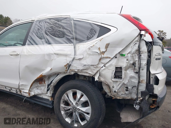 2014 Honda CR-V EX-L with VIN 5J6RM4H77EL015907, listed as a IAAI auction lot 41709554 with 133,550 mi miles. Bid and sale history available at carsss.com. Image 6.