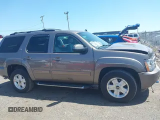 2013 Chevrolet Tahoe LT with VIN 1GNSKBE09DR325729, listed as a IAAI auction lot 41989587 with 186,361 mi miles and . Bid and sale history available at DreamBid. Image 13.