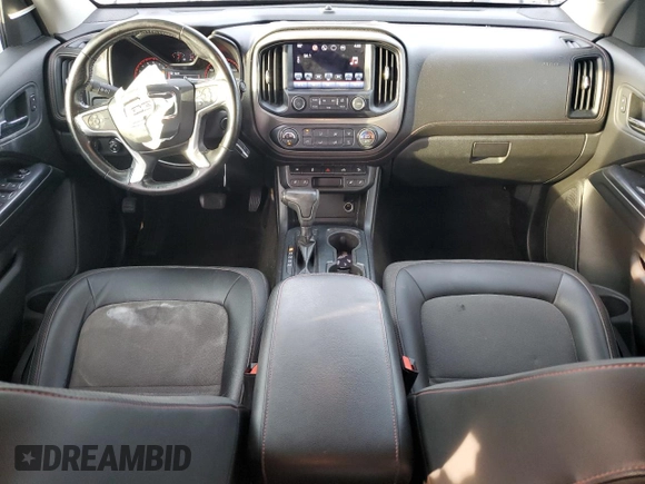 2016 GMC Canyon 4WD SLE with VIN 1GTG6CE35G1370091, listed as a Copart auction lot 87124814 with 130,583 mi miles and Salvage Title. Bid and sale history available at carsss.com. Image 8.