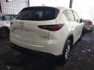 2023 Mazda CX-5 2.5 S Carbon Edition with VIN JM3KFBCM7P0192553, listed as a IAAI auction lot 41893002 with 54,121 mi miles. Bid and sale history available at carsss.com. Image 4.