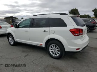 2015 Dodge Journey SXT with VIN 3C4PDCBGXFT743372, listed as a Copart auction lot 65270895 with 119,593 mi miles and Salvage title. Bid and sale history available at DreamBid. Image 2.
