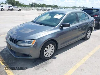 2014 Volkswagen Jetta S with VIN 3VW2K7AJ0EM217942, listed as a IAAI auction lot 42665485 with 140,084 mi miles and . Bid and sale history available at DreamBid. Image 2.