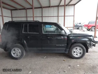 2016 Jeep Patriot Sport with VIN 1C4NJPBB2GD763490, listed as a IAAI auction lot 41613265 with 104,806 mi miles. Bid and sale history available at carsss.com. Image 13.