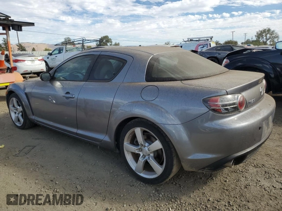 2004 Mazda RX-8 with VIN JM1FE17N240117619, listed as a Copart auction lot 77235454 with 121,887 mi miles and Clean Title. Bid and sale history available at carsss.com. Image 2.