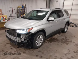 2018 Chevrolet Traverse LT Cloth z VIN 1GNEVGKW9JJ144070, wystawiony jako IAAI lot #42118002 z przebiegiem 142 006 mil mil oraz . Historia ofert i sprzedaży dostępna na DreamBid. Obrazek 2.