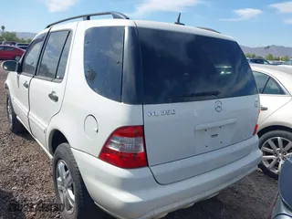 2004 Mercedes-Benz M-Class 3.5L with VIN 4JGAB57E04A502211, listed as a IAAI auction lot 39441932 with 1 mi miles. Bid and sale history available at carsss.com. Image 3.