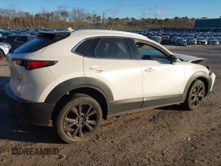 2021 Mazda CX-30 Premium with VIN 3MVDMBDY2MM236118, listed as a IAAI auction lot 41182309 with 32,286 mi miles and . Bid and sale history available at carsss.com. Image 4.