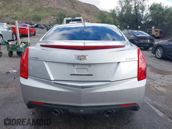 2018 Cadillac ATS Luxury RWD z VIN 1G6AB5RX6J0110860, wystawiony jako IAAI lot #41556662 z przebiegiem 63 886 mil mil oraz . Historia ofert i sprzedaży dostępna na DreamBid. Obrazek 17.