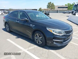 2016 Kia Optima LX Turbo with VIN 5XXGT4L12GG077169, listed as a IAAI auction lot 42108788 with 116,589 mi miles. Bid and sale history available at carsss.com. Image 1.