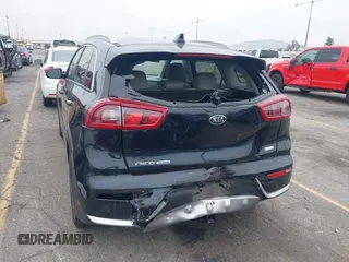 2017 Kia Niro Touring with VIN KNDCE3LC6H5048381, listed as a IAAI auction lot 42035129 with 133,559 mi miles. Bid and sale history available at carsss.com. Image 16.