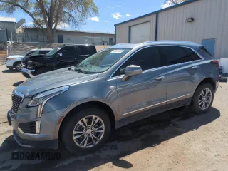 2021 Cadillac XT5 FWD Premium Luxury with VIN 1GYKNCRS1MZ106839, listed as a Copart auction lot 52950495 with 104,526 mi miles and Salvage title. Bid and sale history available at DreamBid. Image 1.