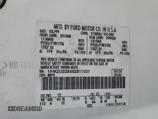 1999 Ford Explorer z VIN 1FMZU32X4XZB11031, wystawiony jako Copart lot #82640184 z przebiegiem 149 331 mil mil oraz Szkoda całkowita • Salvage title. Historia ofert i sprzedaży dostępna na DreamBid. Obrazek 13.