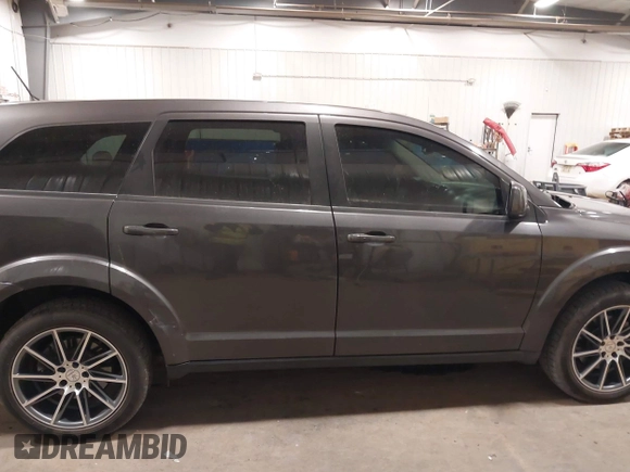 2017 Dodge Journey GT z VIN 3C4PDDEG0HT623813, wystawiony jako IAAI lot #40992814 z przebiegiem 109 898 mil mil oraz . Historia ofert i sprzedaży dostępna na DreamBid. Obrazek 13.