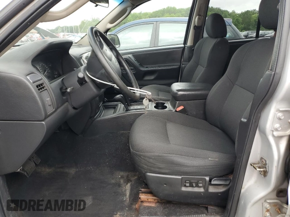 2004 Jeep Grand Cherokee Laredo with VIN 1J4GW48S44C203546, listed as a Copart auction lot 61270315 with 161,534 mi miles and Clean title. Bid and sale history available at DreamBid. Image 7.