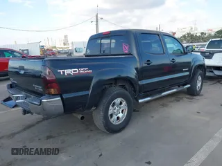 2008 Toyota Tacoma PreRunner with VIN 3TMJU62N88M058614, listed as a IAAI auction lot 41442510 with 140,973 mi miles. Bid and sale history available at carsss.com. Image 4.