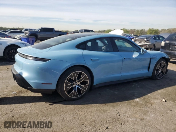 2023 Porsche Taycan with VIN WP0AA2Y11PSA11164, listed as a Copart auction lot 50695385 with 23,833 mi miles and Salvage Title. Bid and sale history available at DreamBid. Image 3.