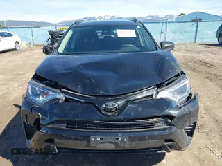 2017 Toyota RAV4 LE with VIN 2T3BFREV2HW543163, listed as a IAAI auction lot 41875755 with 96,398 mi miles and . Bid and sale history available at carsss.com. Image 12.
