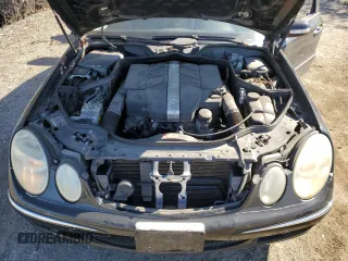 2003 Mercedes-Benz E-Class 3.2L with VIN WDBUF65J03A281430, listed as a Copart auction lot 77086054 with 121,080 mi miles and Salvage Title. Bid and sale history available at carsss.com. Image 12.