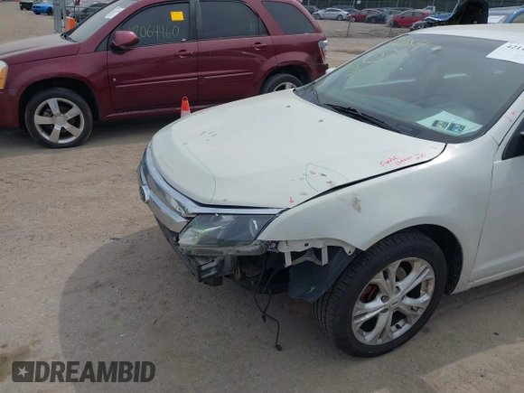 2012 Ford Fusion SE with VIN 3FAHP0HG7CR351904, listed as a IAAI auction lot 42115834 with 80,659 mi miles and . Bid and sale history available at DreamBid. Image 6.