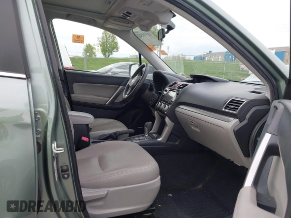 2016 Subaru Forester Limited with VIN JF2SJARCXGH406079, listed as a IAAI auction lot 41974522 with 64,910 mi miles and . Bid and sale history available at DreamBid. Image 5.