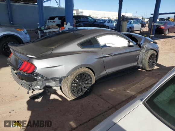 2021 Ford Mustang GT z VIN 1FA6P8CF9M5103856, wystawiony jako Copart lot #49406715 z przebiegiem 27 499 mil mil oraz Szkody całkowita. Historia ofert i sprzedaży dostępna na DreamBid. Obrazek 3.