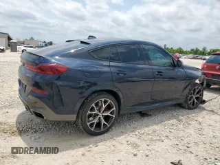 2022 BMW X6 M50i z VIN 5UXCY8C09N9J10045, wystawiony jako Copart lot #57225715 z przebiegiem 54 024 mil mil oraz Szkoda całkowita • Salvage title. Historia ofert i sprzedaży dostępna na DreamBid. Obrazek 3.